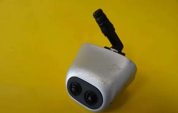 Headlight washer spray nozzle
