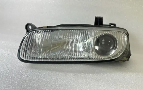 Mazda 323 F Headlight/headlamp 11061708 3125 3315