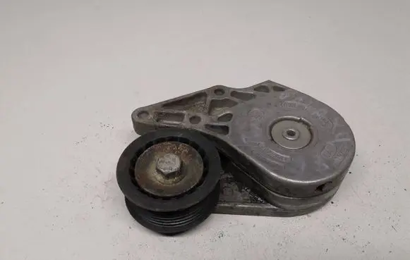 Volkswagen Golf II Generator/alternator belt tensioner 021145299C