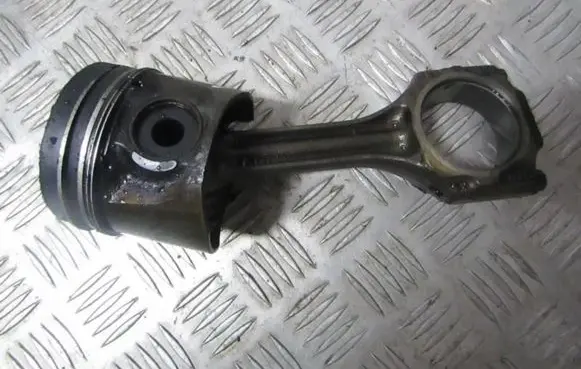 Piston with connecting rod