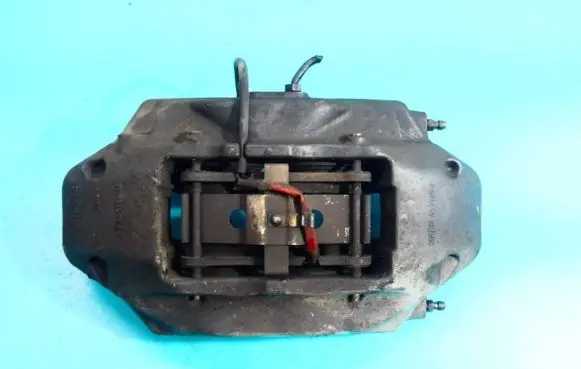 Volkswagen Touareg I Front brake caliper IMPRK1293818