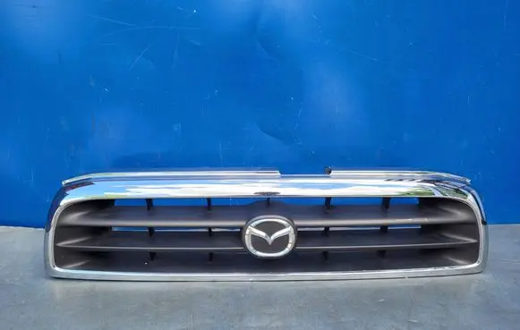 Mazda B series UN Front bumper upper radiator grill BT0679723 UH7150710
