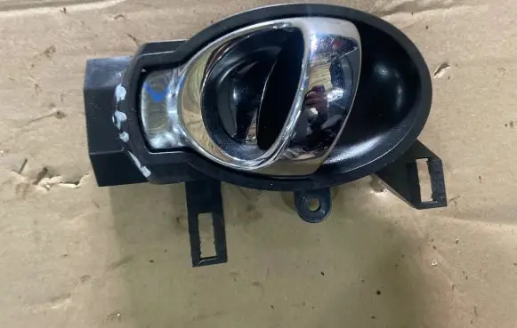 Nissan Juke I F15 Rear door interior handle