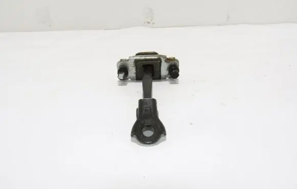 KIA Carens II Rear door check strap stopper Nėra