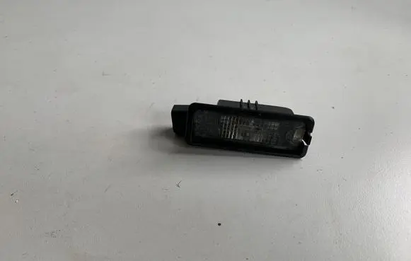 Volkswagen Scirocco Number plate light 1K8943021