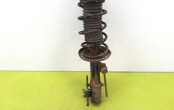 Opel Corsa D Front shock absorber with coil spring