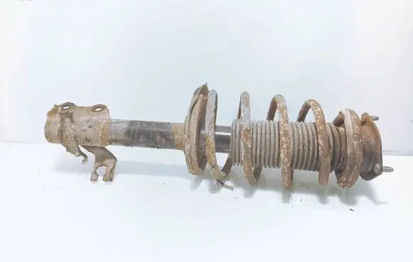 Nissan Almera N16 Front shock absorber with coil spring