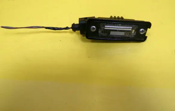 Volkswagen Golf V Number plate light 1J6943021B