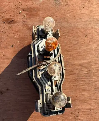 Citroen Berlingo Tail light bulb cover holder