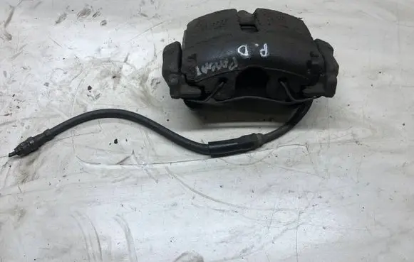 Volkswagen PASSAT B7 Front brake caliper