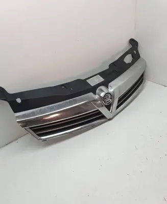Opel Zafira B Front bumper upper radiator grill 13225788 13225789