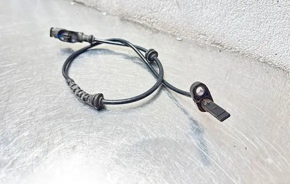 Opel Corsa D ABS brake wheel speed sensor AT5B2 13623700