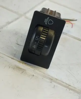 Panel lighting control switch