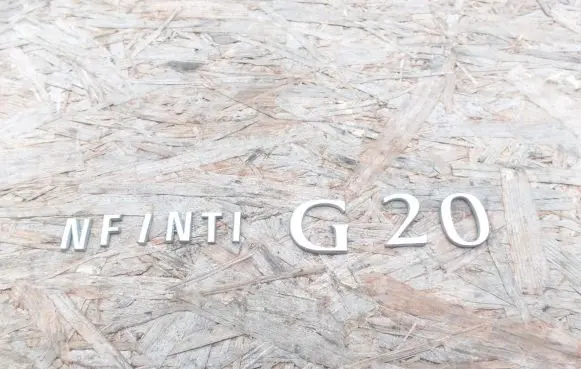 Infiniti G20 Rear loading door model letters 