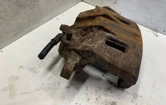 Hyundai Santa Fe Front brake caliper AD094100