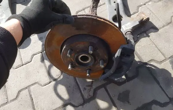 Front wheel hub spindle knuckle