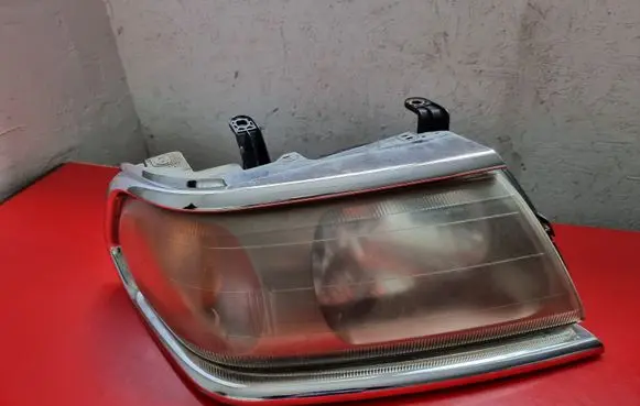 Mitsubishi Pajero Sport I Headlight/headlamp 10087415