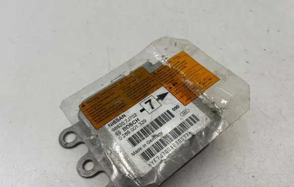 Nissan Primera Airbag control unit/module 988207J702 0285001329 YE7J700X230577