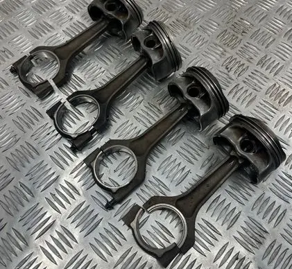 Piston with connecting rod