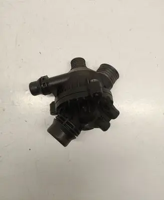 Thermostat/thermostat housing