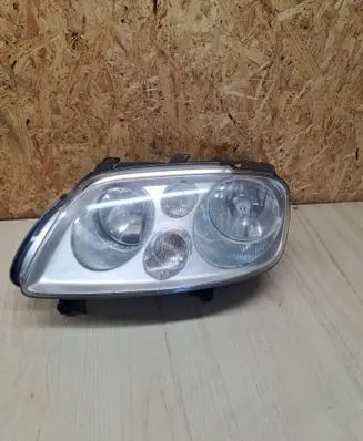 Volkswagen Touran I Headlight/headlamp 0301205203 1T0941005M