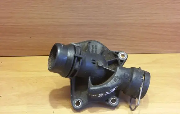 Thermostat/thermostat housing