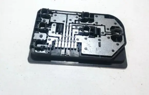 Tail light bulb cover holder