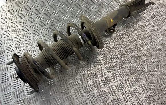 Front shock absorber with coil spring