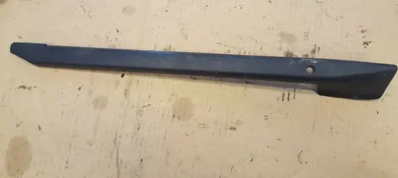 Volkswagen Golf II Front driver seat rail trim 191881087A