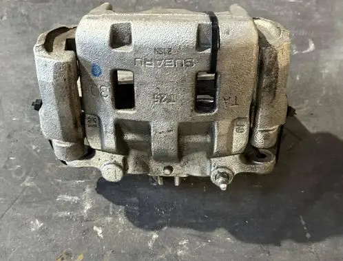Subaru Outback (BT) Front brake caliper