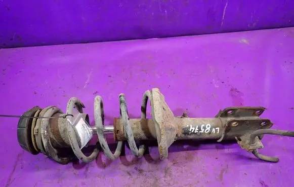 Chevrolet Nubira Front shock absorber with coil spring 