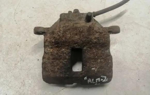 Nissan Almera N16 Front brake caliper