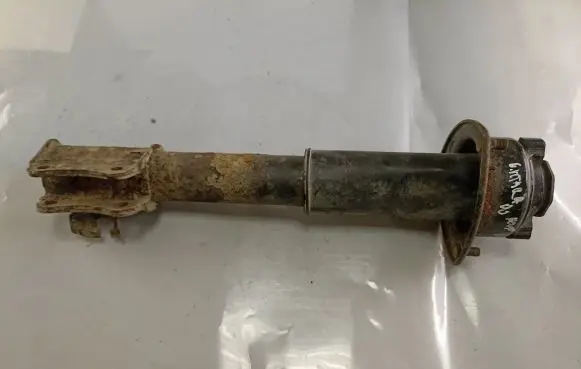 Suzuki Grand Vitara I Front shock absorber/damper