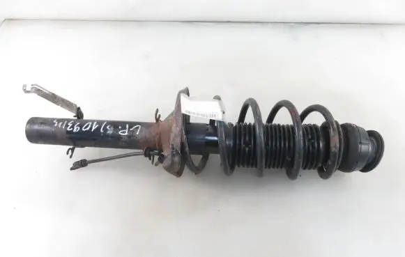 Volkswagen Golf IV Front shock absorber with coil spring