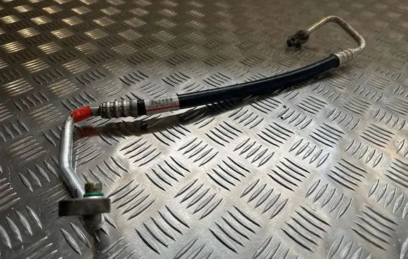 KIA Sportage Air conditioning (A/C) pipe/hose 97762F1000