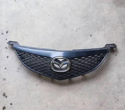 Mazda 3 I Front bumper upper radiator grill BN8V50711