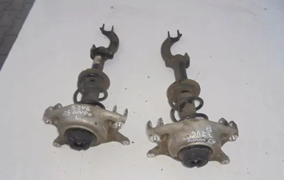 Renault Megane III Front shock absorber with coil spring MCPERSON