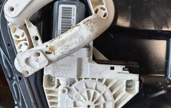 Front door window regulator motor