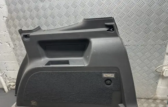 Trunk/boot lower side trim panel