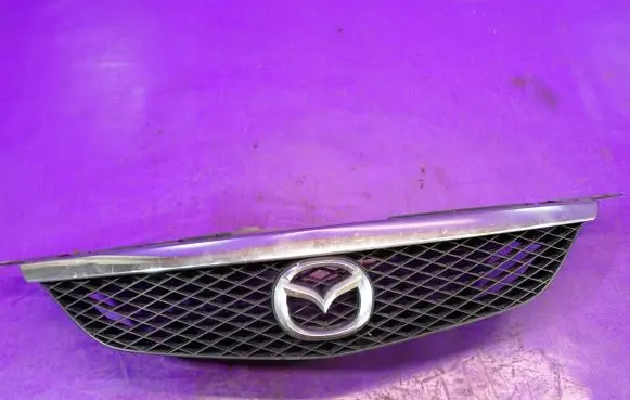 Mazda 323 Front bumper upper radiator grill B30K5071X