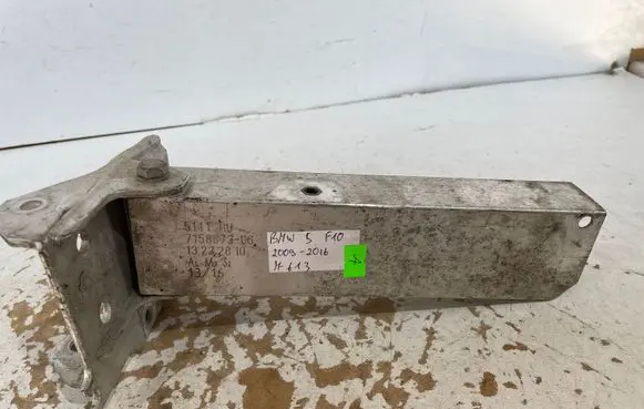 Radiator support slam panel bracket