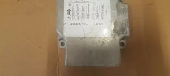 Volkswagen Touran I Airbag control unit/module 1T0909605