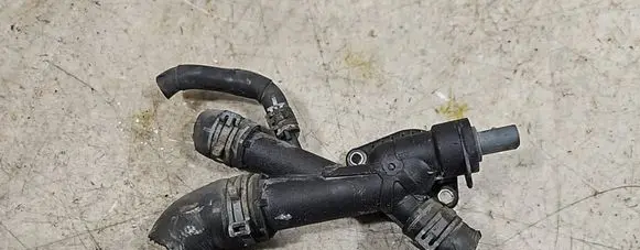 Volkswagen Caddy Engine coolant pipe/hose 03L121131AA