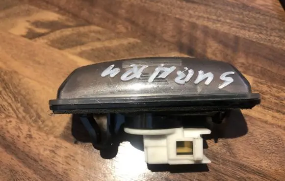 Subaru Impreza III Number plate light