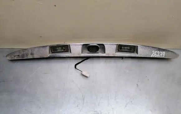 KIA Carens II Number plate light 735335751