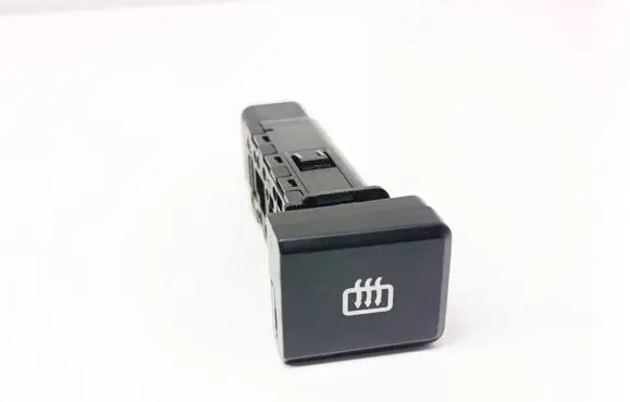 KIA Carens I Windscreen/window heater switch 