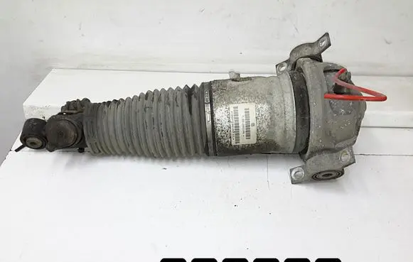 Volkswagen Touareg I Front shock absorber/damper 7l6512021ag