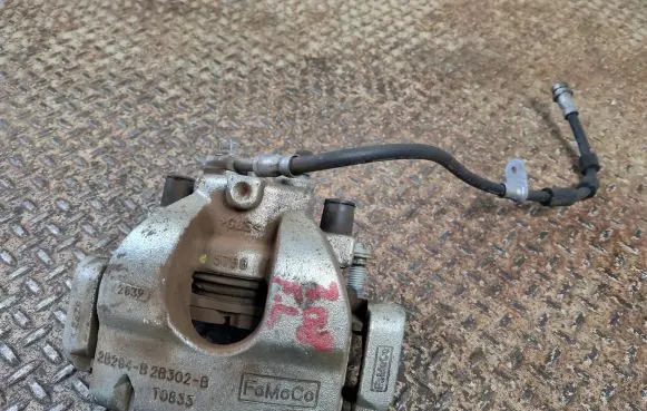 Ford Escape IV Front brake caliper 2B294B2B302B