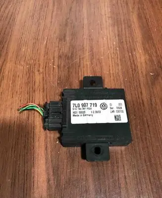 Volkswagen Touareg I Alarm control unit/module 7L0907719