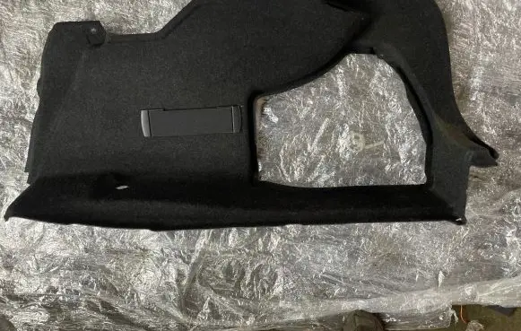 Trunk/boot lower side trim panel